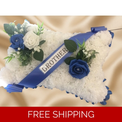 Artificial Blue & White Pillow Tribute – Elegant Funeral Arrangement with Roses and Ribbon